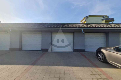 Newer, spacious garage for sale near apartment buildings in Komárno